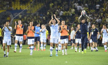 Dynamo Kyiv players celebrate after beating Fenerbahce on July 27. UEFA has opened an investigation after Fenerbahce fans were heard singing Russian President Vladimir Putin's name during a Champions League qualifier against Dynamo Kyiv.