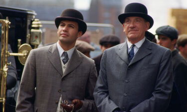 David Warner (right) played Spicer Lovejoy in "Titanic