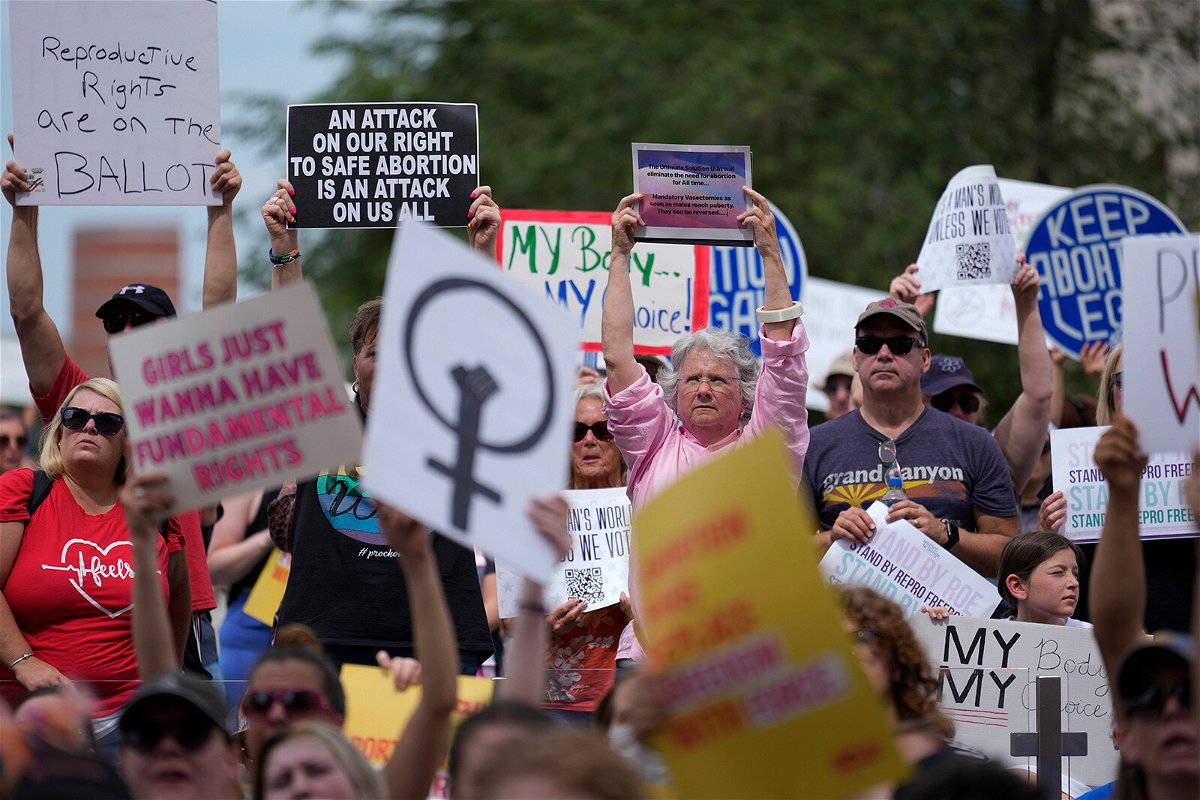 <i>AJ Mast/AP</i><br/>Abortion-rights activists rally at the Indiana Statehouse following the Supreme Court's decision to overturn Roe v. Wade on June 25 in Indianapolis. Indiana lawmakers are reconvening on July 25 to consider more restrictions on abortion.