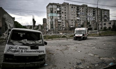 Destroyed vehicles are pictured in the city of Lysychansk in the eastern Ukrainian region of Donbas on June 18
