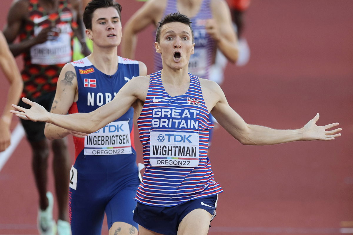 <i>Andy Lyons/Getty Images</i><br/>A stunned Jake Wightman crosses the finish line ahead of Jakob Ingebrigtsen in a victory seen -- and commentated on -- by his father.