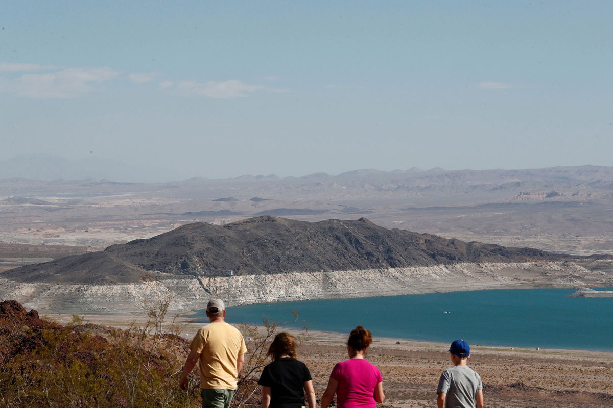 <i>Shutterstock</i><br/>People look out at Lake Mead from the Overlook at Hoover Dam Lodge in Boulder City