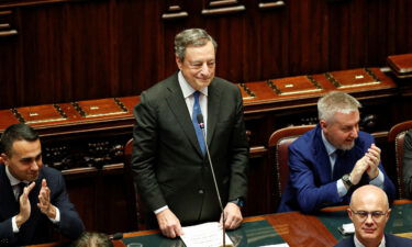 Italy's Prime Minister Mario Draghi addresses to the lower house of parliament ahead of a vote of confidence in Rome on June 20.