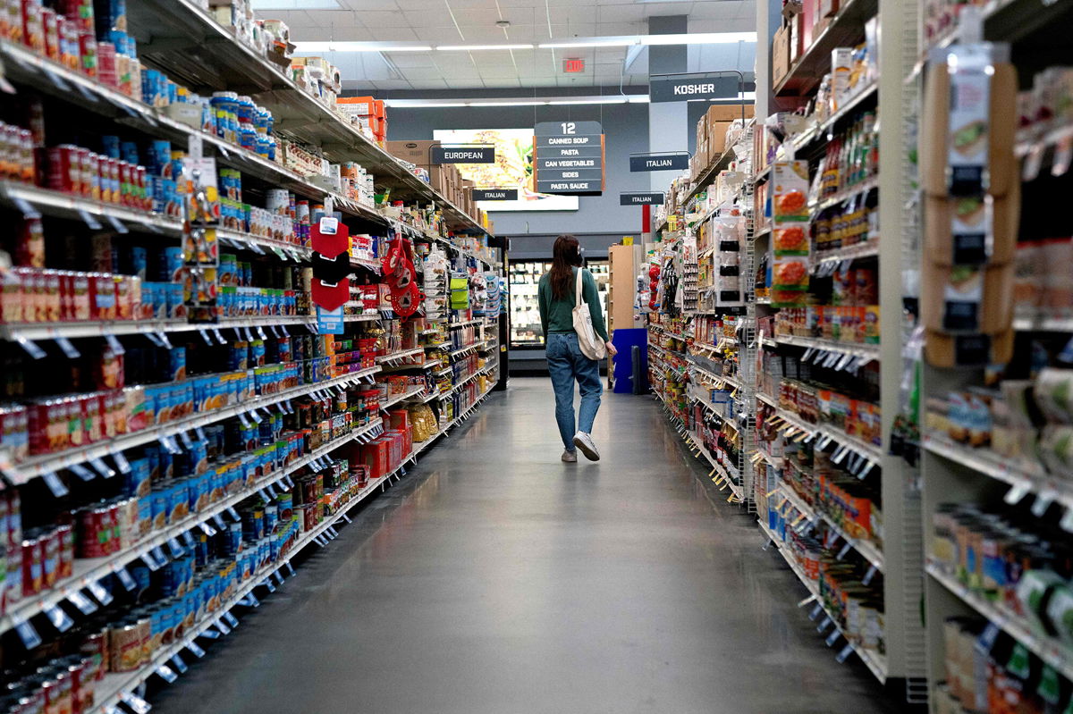 <i>Stefani Reynolds/AFP/Getty Images</i><br/>A shopper is pictured in a grocery store in Washington