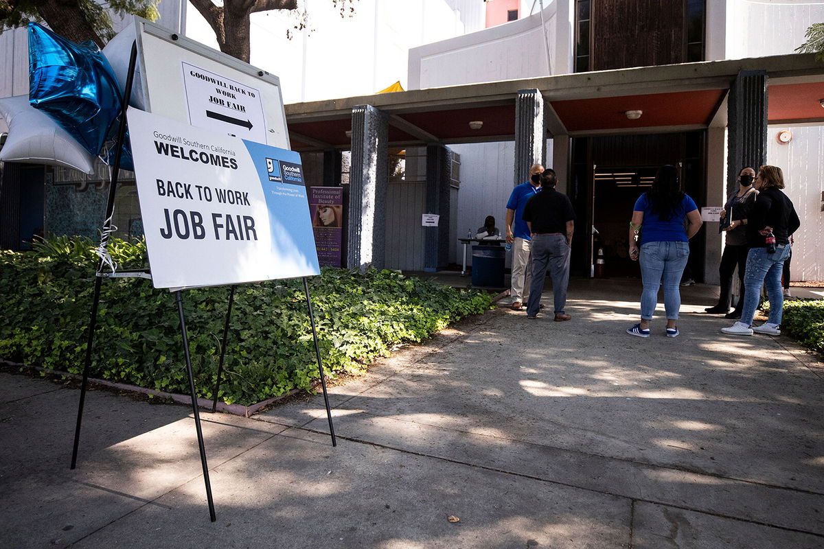 <i>Etienne Laurent/EPA-EFE/Shutterstock</i><br/>A sign reads 'Back to Work Job Fair' at the entrance of the Southern California Goodwill in Los Angeles