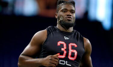 Ojabo runs the 40-yard dash during the 2022 NFL Combine at Lucas Oil Stadium.