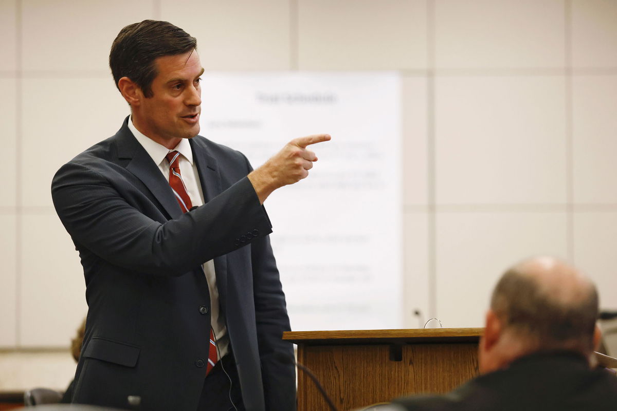 <i>Daniel Dreifuss/Monterey County Weekly/AP</i><br/>Prosecutor Christopher Peuvrelle delivers his opening statement in the murder trial of Paul and Ruben Flores.