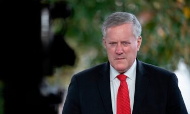 Then-White House chief of staff Mark Meadows talks to reporters at the White House in October 2020 in Washington