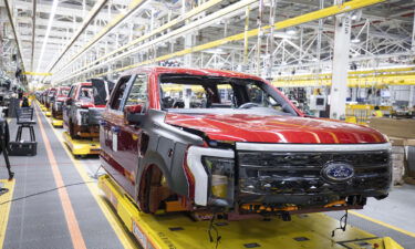 Ford F-150 Lightning pickup trucks sit on the production line at the Ford Rouge Electric Vehicle Center on April 26 in Dearborn