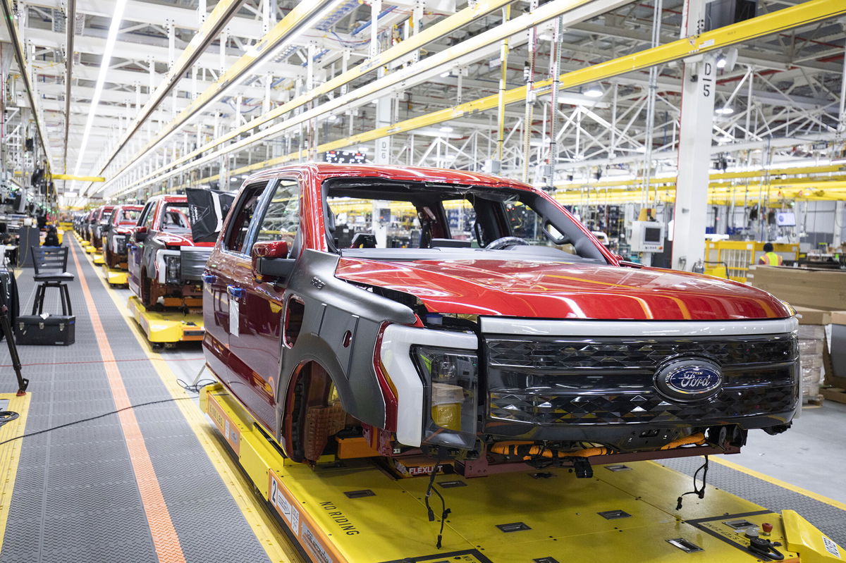 <i>Bill Pugliano/Getty Images</i><br/>Ford F-150 Lightning pickup trucks sit on the production line at the Ford Rouge Electric Vehicle Center on April 26 in Dearborn