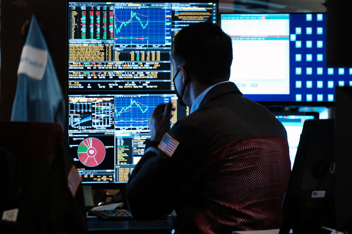 <i>Spencer Platt/Getty Images</i><br/>Traders work on the floor of the New York Stock Exchange (NYSE) on July 25