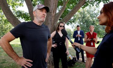 Comedian Jon Stewart gives an interview to reporters on July 28 at the U.S. Capitol