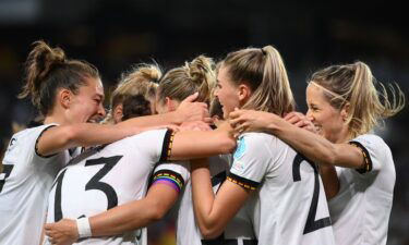 Germany's players celebrate Popp's opening goal of the match.
