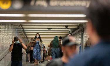 Some commuters don masks in New York's Times Square subway station last week.