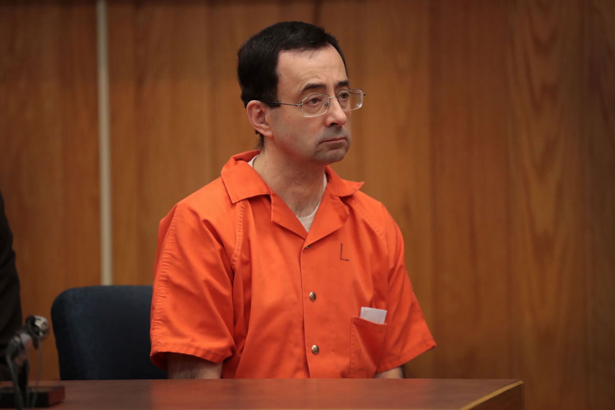 <i>Scott Olson/Getty Images</i><br/>Larry Nassar sits in court listening to statements before being sentenced by Judge Janice Cunningham for three counts of criminal sexual assault in Eaton County Circuit Court on February 5