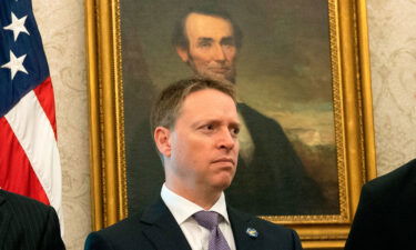 Then-deputy national security adviser Matthew Pottinger looks on as then-President Donald Trump speaks in the Oval Office of the White House in September 2020.