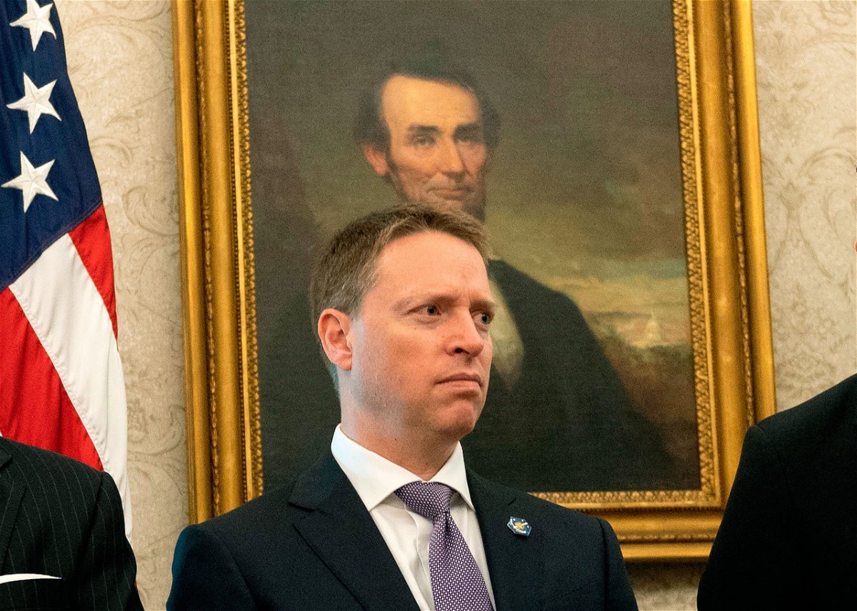 <i>Andrew Caballero-Reynolds/AFP/Getty Images</i><br/>Then-deputy national security adviser Matthew Pottinger looks on as then-President Donald Trump speaks in the Oval Office of the White House in September 2020.