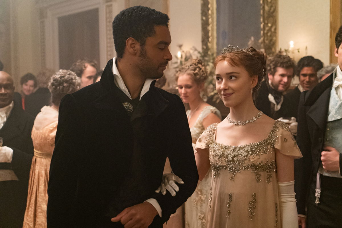 <i>Liam Daniel/Netflix</i><br/>Regé-Jean Page pictured with Phoebe Dynevor in 