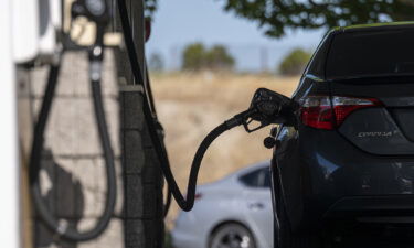 A fuel nozzle in a car at a Shell gas station in Hercules