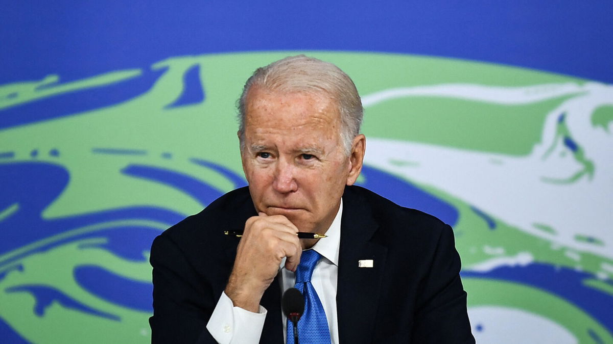 <i>BRENDAN SMIALOWSKI/AFP via Getty Images</i><br/>President Joe Biden listens during a meeting on 
