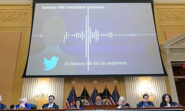 A video of a recording from a Twitter interview is displayed as the House select committee investigating the Jan. 6 attack on the U.S. Capitol holds a hearing at the Capitol in Washington