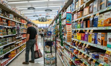 A customer shops in a Kroger grocery store on July 15 in Houston