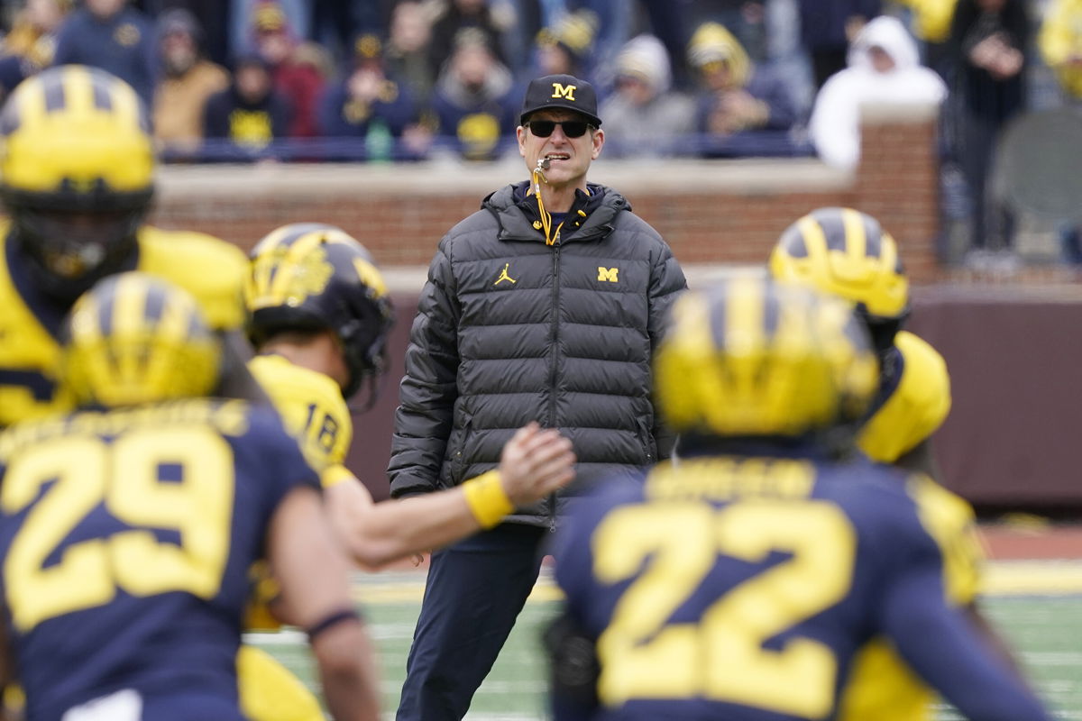 <i>Carlos Osorio/AP</i><br/>Harbaugh watches on during an intra-squad spring game.