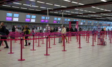 Empty check-in desks at London Luton Airport.