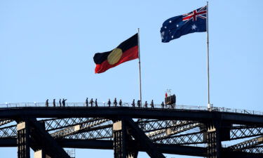 The Aboriginal flag will permanently replace the state flag on the Sydney Harbour Bridge. In this image