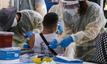 A healthcare worker prepares the Monkeypox vaccine at Eugene A. Obregon Park in Los Angeles on July 20.