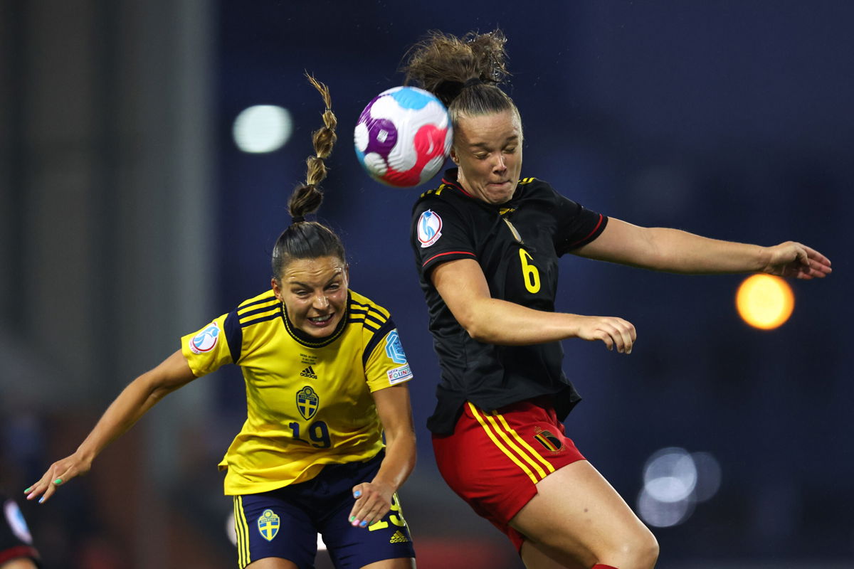 <i>Robbie Jay Barratt/AMA/Getty Images</i><br/>Sweden's Johanna Rytting Kaneryd (left) challenges for a header with Tine De Caigny of Belgium (right).