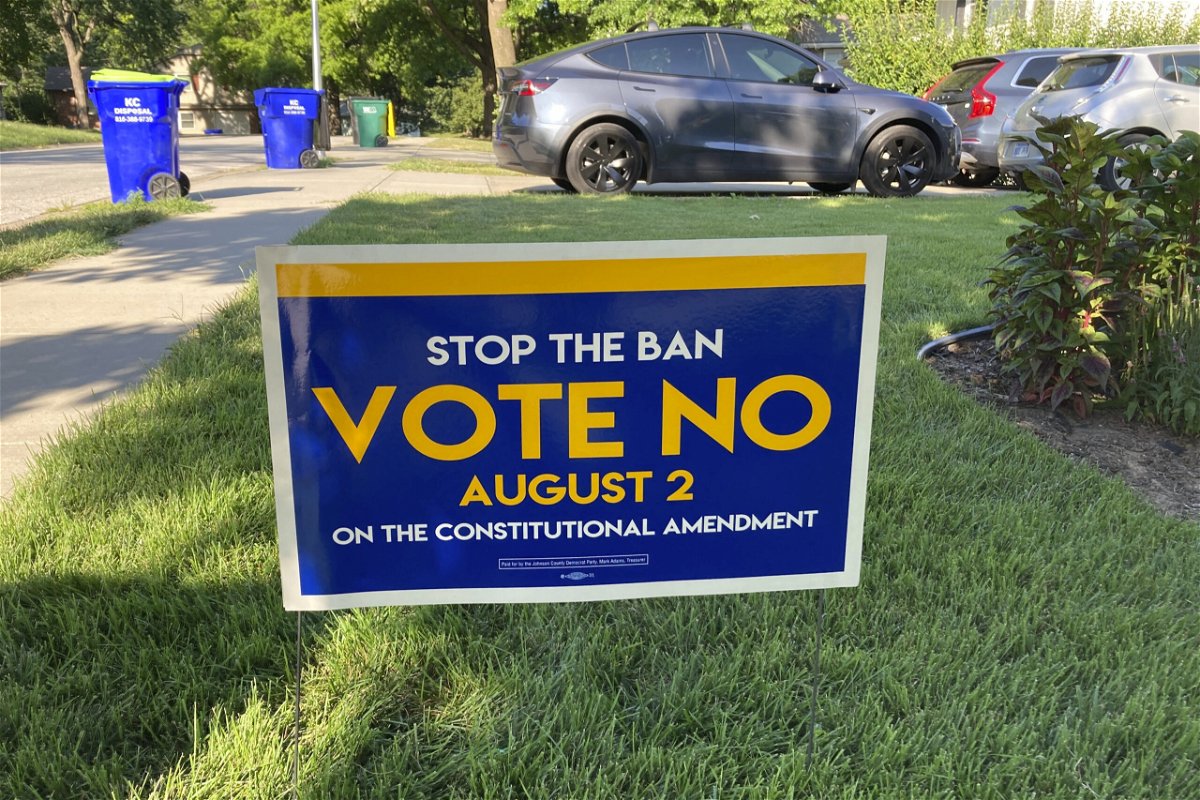 In this photo from Thursday, July 14, 2022, a sign in a yard in Merriam, Kansas, urges voters to oppose a proposed amendment to the Kansas Constitution to allow legislators to further restrict or ban abortion. Opponents of the measure believe it will lead to a ban on abortion in Kansas.