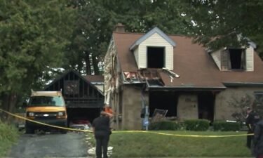 A 36-year-old woman was found dead in a burning home early Thursday morning.