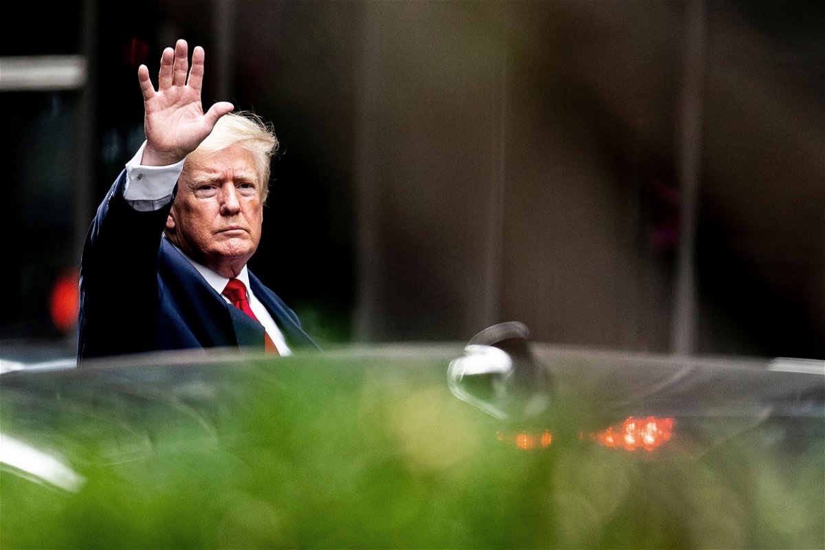 <i>Julia Nikhinson/AP</i><br/>Former President Donald Trump waves as he departs Trump Tower on August 10 in New York. The Justice Department issued a new subpoena to the National Archives for more January 6 documents.