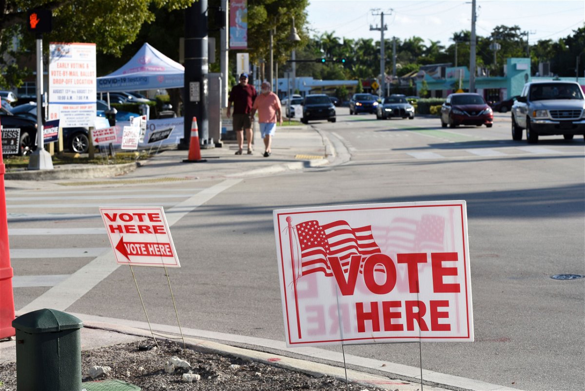 <i>Michele Eve Sandberg/Sipa USA/AP</i><br/>Voting signs are seen displayed on August 23