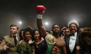 Trevante Rhodes (second from right) as Mike Tyson and Russell Hornsby as Don King in Hulu's 'Mike.'