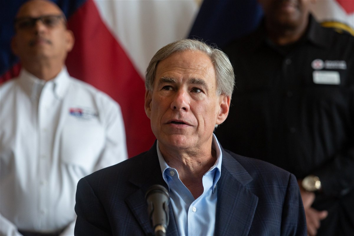 <i>Shelby Tauber/Bloomberg/Getty Images</i><br/>Gov. Greg Abbott speaks during a news conference in Dallas