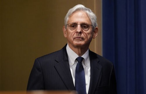 Attorney General Merrick Garland arrives to speak at the Justice Department