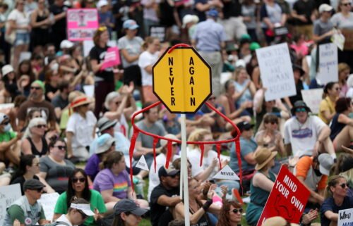 A homemade sign resembling a cloth hanger is seen as abortion rights protesters participate in nationwide demonstrations following the leaked Supreme Court opinion suggesting the possibility of overturning the Roe v. Wade abortion rights decision