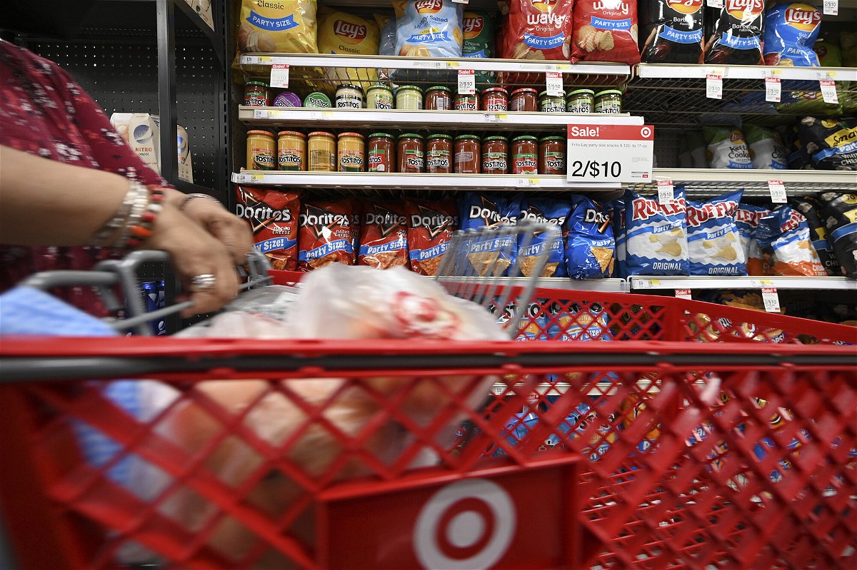 <i>Anthony Behar/Sipa/AP</i><br/>Discounts are back. A woman here shops at a Target store in New York City