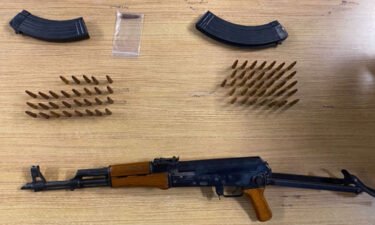 Law enforcement found a suitcase containing a loaded AK-47-style rifle