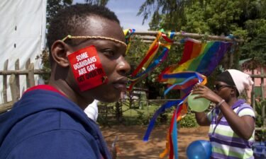 A Ugandan man takes part in the annual gay pride in Entebbe