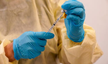 Physician Assistant Susan Eng-Na prepares a syringe with the monkeypox vaccine in New York on August 19. For the first time