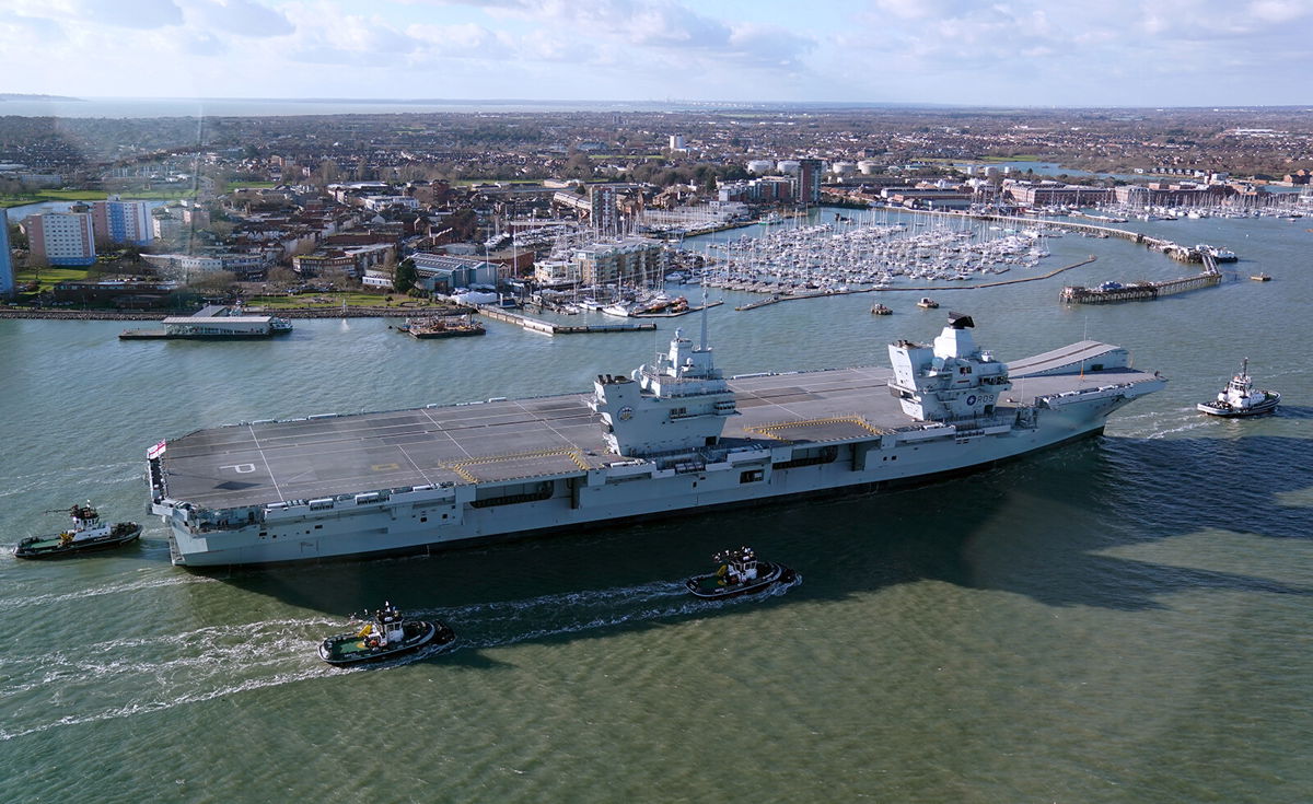 <i>Andrew Matthews/PA Images/Getty Images/FILE</i><br/>HMS Prince of Wales is pictured in Portsmouth Harbour in February. Britain's largest warship