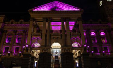 Melbourne Town Hall turned pink on August 9 to honor Olivia Newton-John.