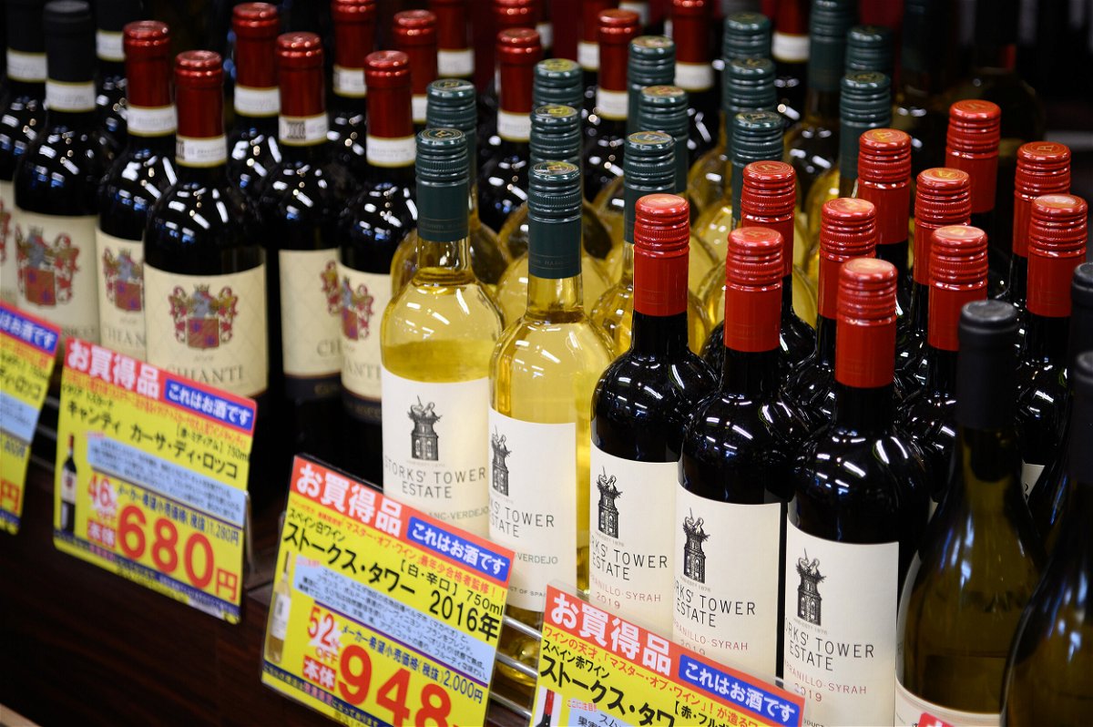 <i>Akio Kon/Bloomberg/Getty Images</i><br/>Japan is launching a contest to find new ways to encourage young people to drink more. Bottles of wine are displayed for sale in Tokyo on April 20.