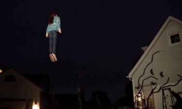 A mannequin dressed as Sadie Sink's Max Mayfield character from "Stranger Things" is hovering in midair outside a Plainfield home.