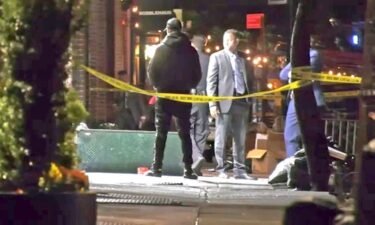 A smoke shop worker was shot during a dispute that spilled out of his  store Sunday night.