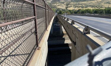 A Farmington man suffered serious injuries after falling 40 feet from a highway overpass.