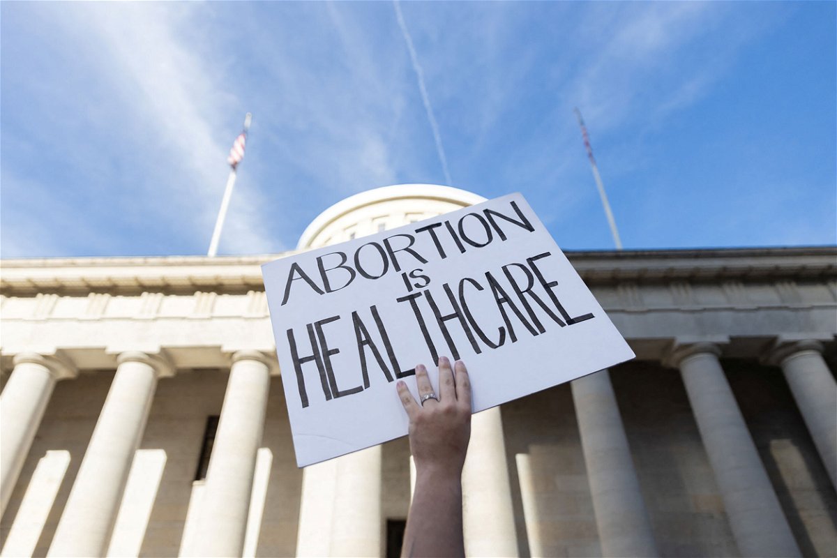 <i>Megan Jelinger/Reuters</i><br/>An abortion rights protester holds a sign at a rally in Columbus